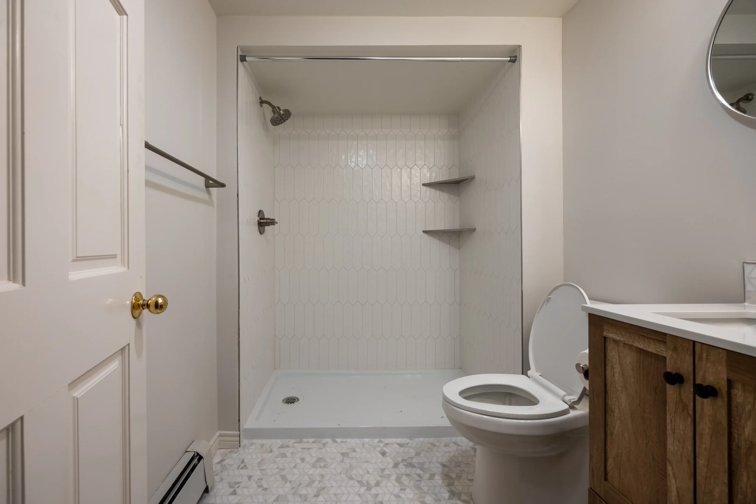 Detailed glass shower and tile installation