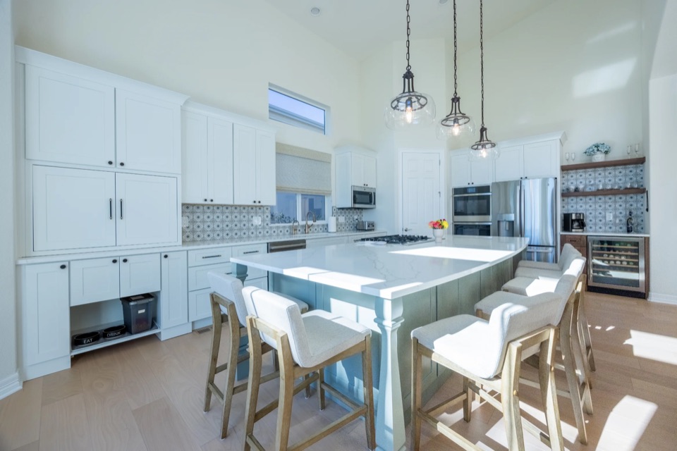 Prime Craft design-build detail featuring a crisp white kitchen remodel