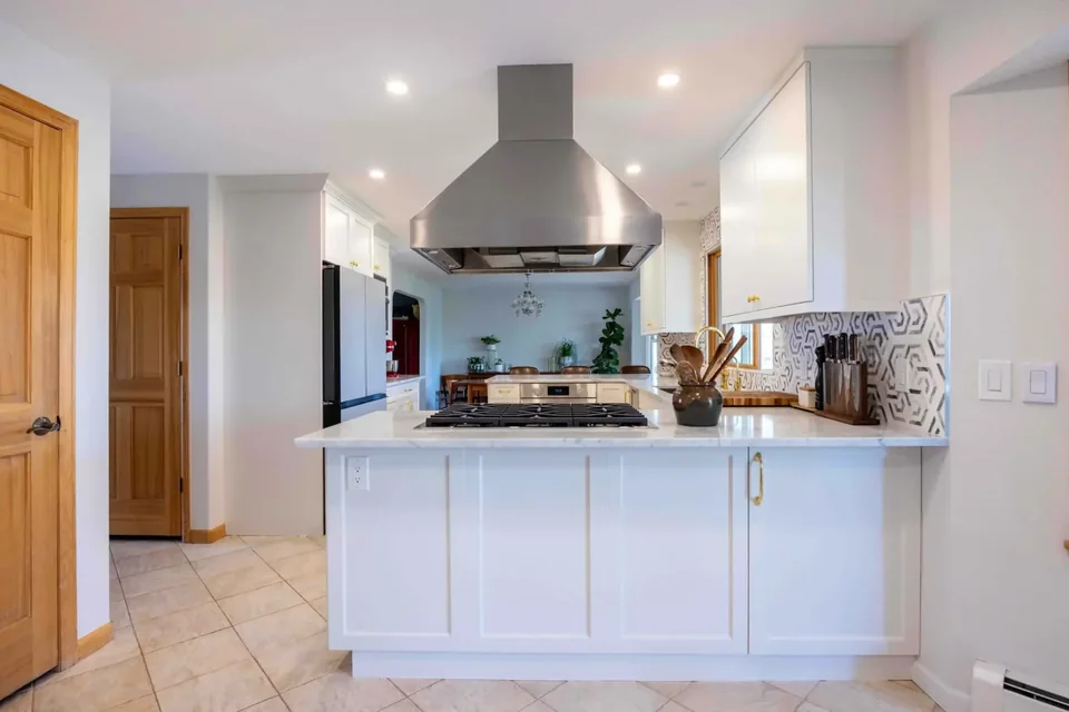Prime Craft design-build detail featuring a space-efficient kitchen peninsula