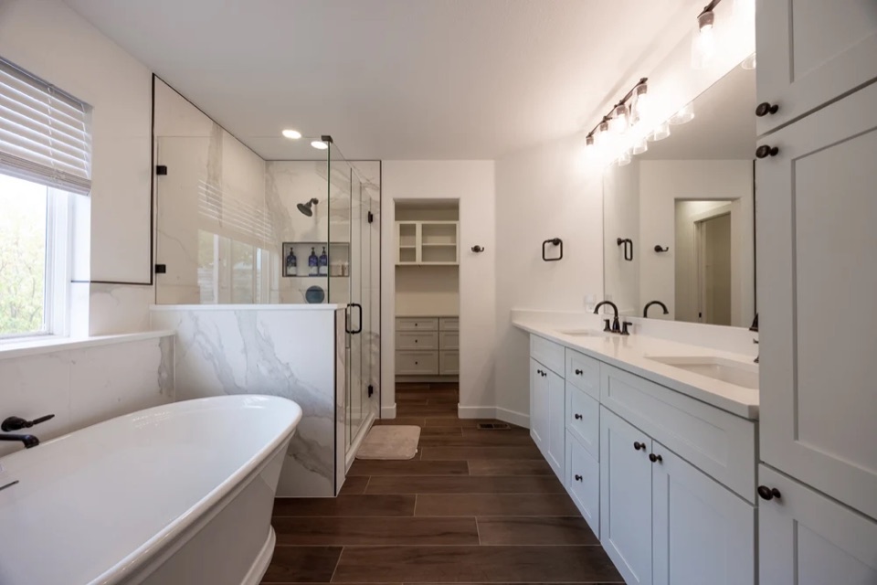 Elegant bathroom transformation in Valley Stream with a freestanding tub and walk-in shower